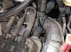 2009 Caravan, hose leaks behind 'dist cap'-leak.jpg