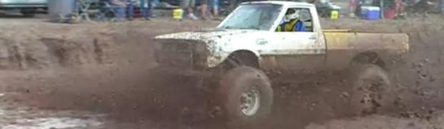 Watch this 440 powered Dodge Ram D50 tear through the mud