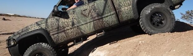 Photo of the Week: Corbo1962’s Camouflaged 2000 Dodge Ram – The Beast