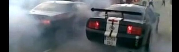 Tire Shredding: Dodge Challenger SRT8 Smokes Out V6 Mustang