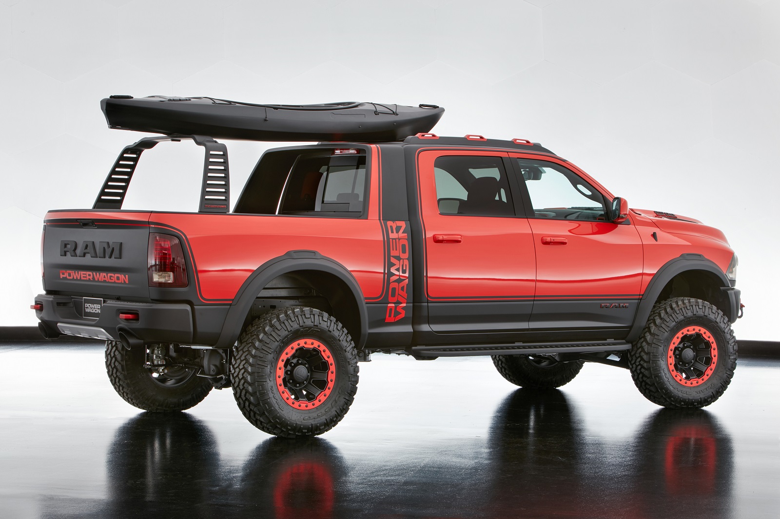 Adaptability is showcased in the 6-ft. x 4-in. bed of the Ram Macho Power Wagon, where a Mopar concept Satin Black accessory sliding RamRack securely stores toys to fit a variety of lifestyles.