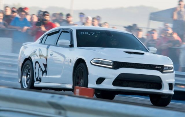 Hellcat Charger Stomps a Nissan GTR in a High Speed Roll Race