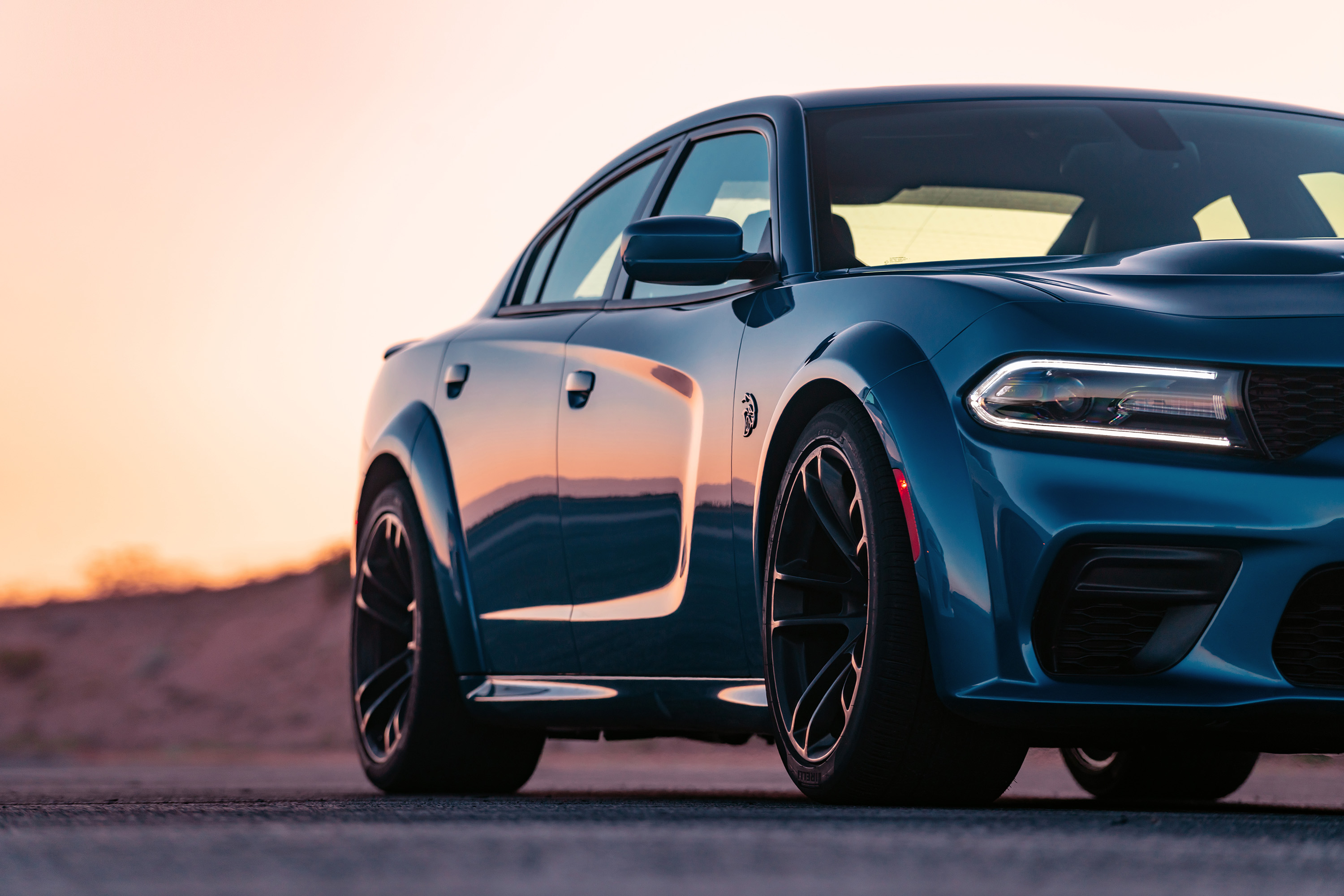 The Charger SRT Hellcat widebody is the most powerful.