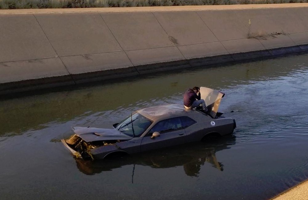 Dodge Challenger in a Canal