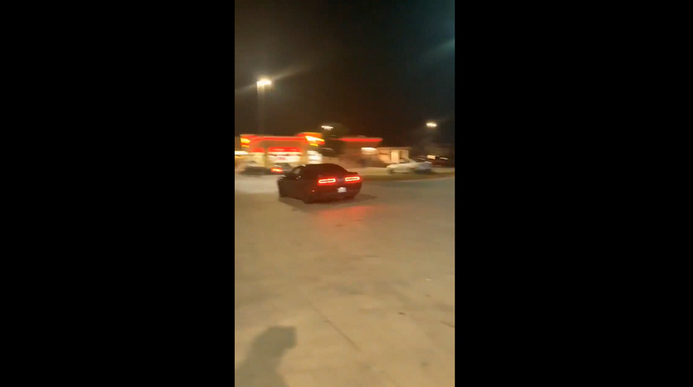 dodgeforum.com Challenger Driver Trashes Front End After Zooming Through a Parking Lot