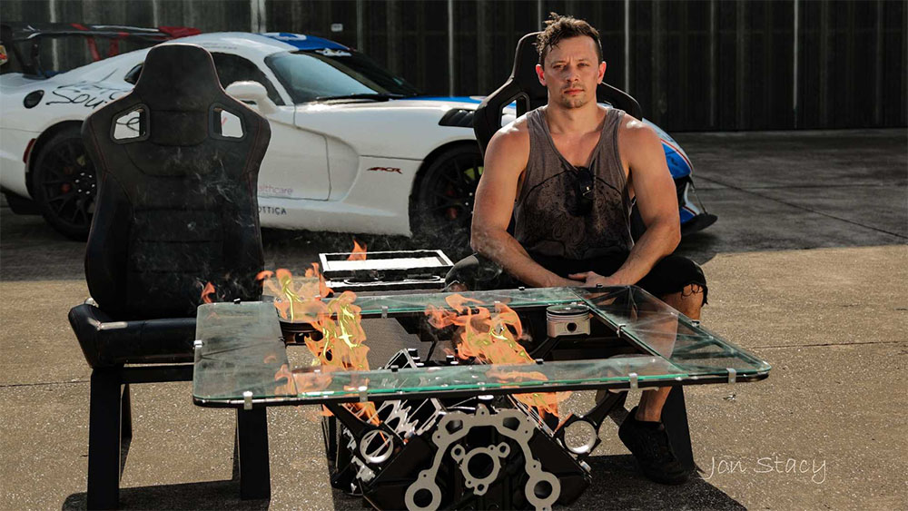 John Cobb of Alaris Invent with Dodge Viper V10 engine fire coffee table