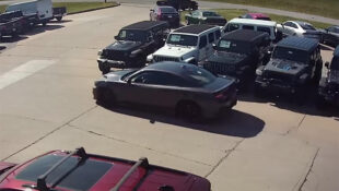 Dodge Charger getting stolen from dealership at gunpoint in broad daylight