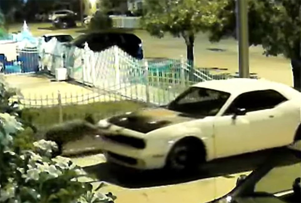 Stolen white Dodge Challenger 