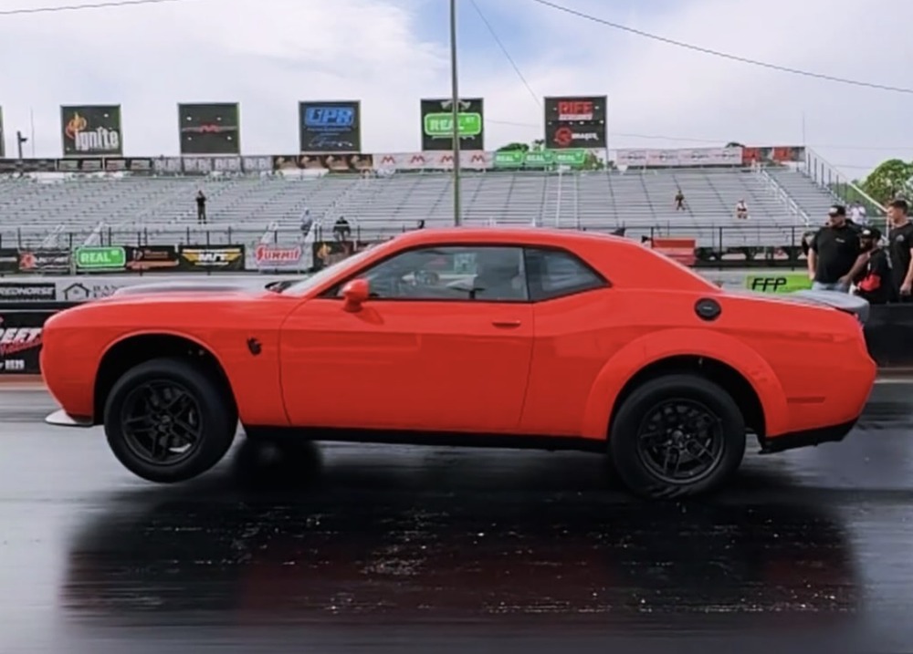 Red Challenger Demon 170 at drag strip
